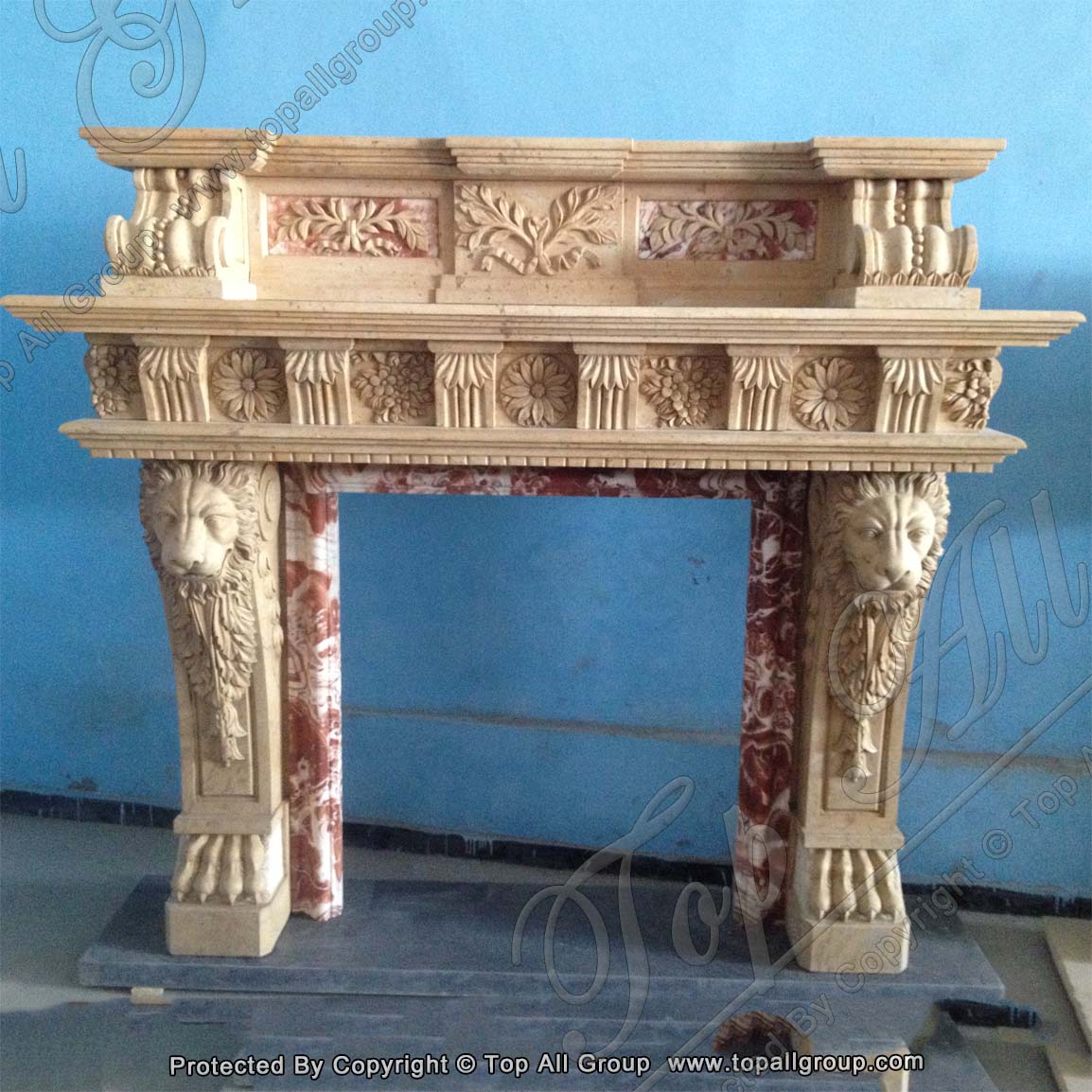 Yellow marble fireplace surround with lion head style